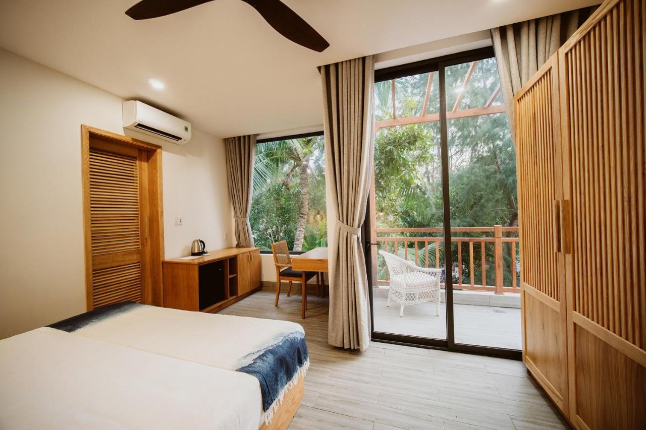 The Watermark Beachside Hotel Хойан Экстерьер фото