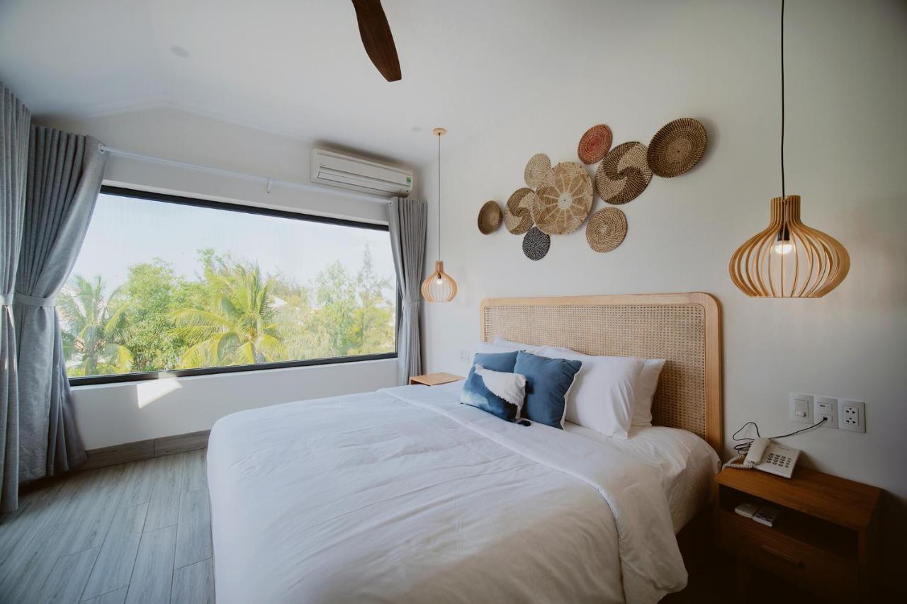 The Watermark Beachside Hotel Хойан Экстерьер фото