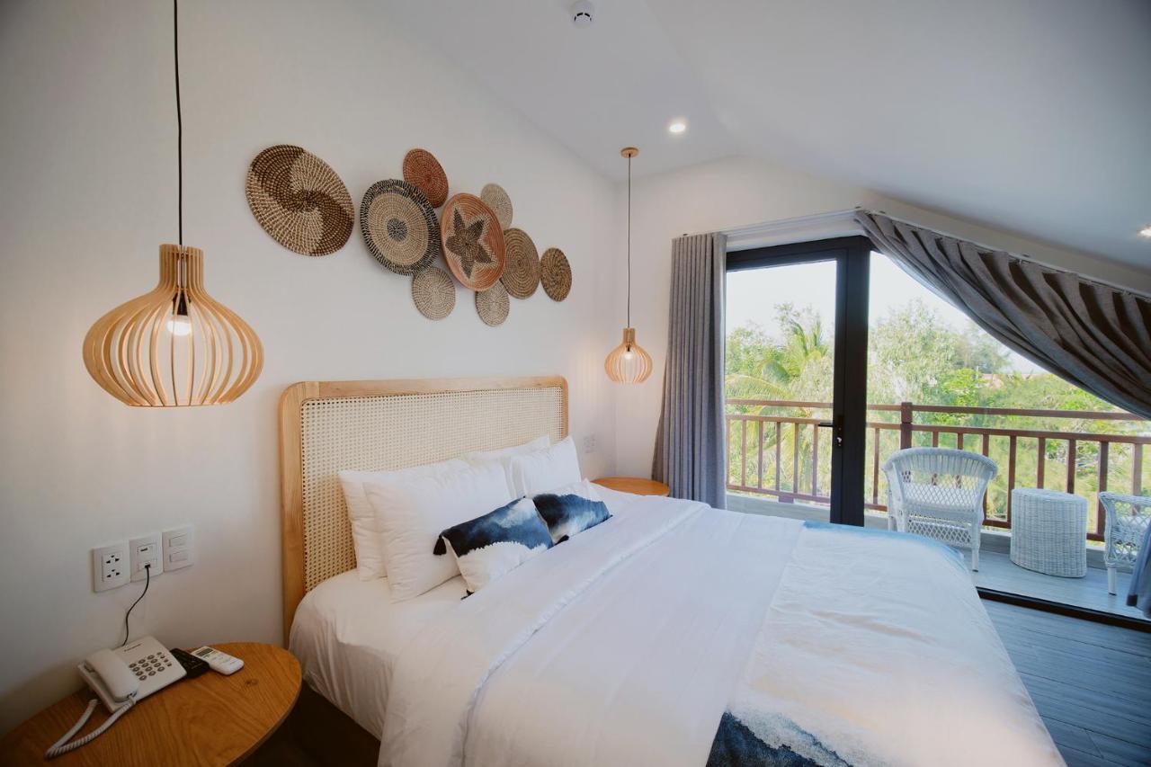 The Watermark Beachside Hotel Хойан Экстерьер фото