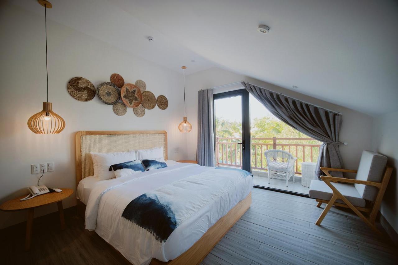 The Watermark Beachside Hotel Хойан Экстерьер фото